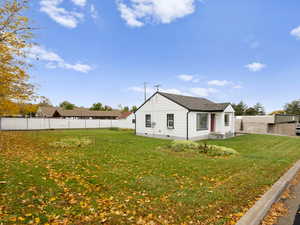 View of home's exterior featuring a fenced backyard