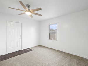 Bedroom with carpet flooring and LVP entry