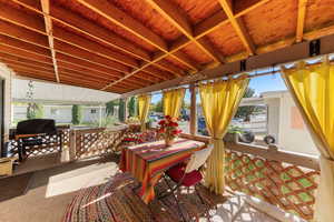 View of patio / terrace with a grill and an outdoor living space