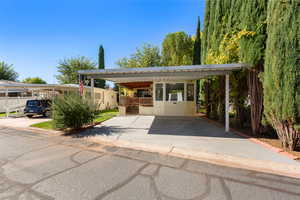 View of front of property with concrete driveway