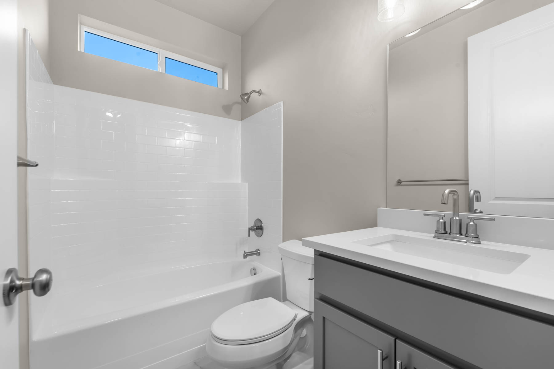 Bathroom featuring shower / bath combination and vanity