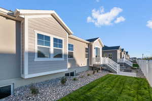 View of side of home with a residential view
