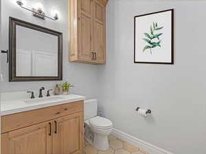 Bathroom with vanity and tile floors