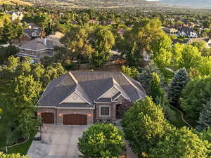 Drone / aerial view of  the home and a mountain backdrop