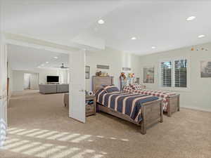 Large bedroom with can light & shutters