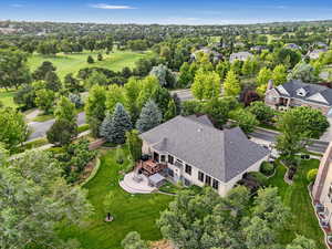 Aerial view of residential area with a tree filled landscape