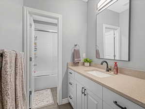 Full bathroom w/ separate room for toilet and tub/shower