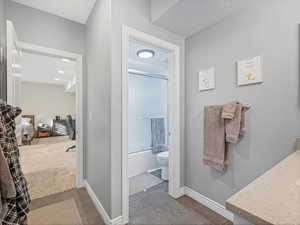 Bathroom w/ separate room for toilet and tub/shower