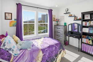 View of carpeted bedroom