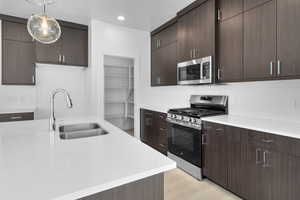 LOTS OF CABINETRY AND LARGE PANTRY! (PICTURE OF PREVIOUS BUILT HOME-COLORS AND MATERIALS MAY VARY)