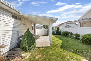 View of yard with a patio