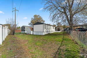 View of fenced backyard