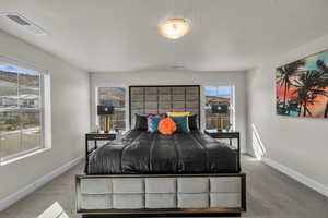 Bedroom with carpet flooring