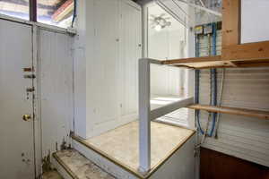 Storage room featuring a ceiling fan