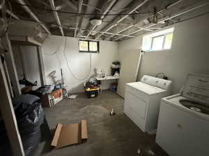 Laundry area featuring separate washer and dryer