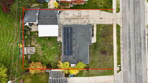 Aerial view of property and surrounding area with property boundaries highlighted