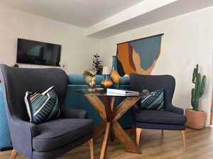 Living room featuring light wood-style flooring