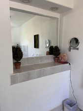 Bathroom with a textured wall