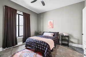 Bedroom featuring carpet flooring and ceiling fan