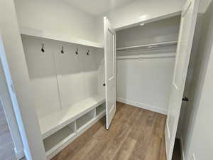 Mudroom featuring light wood-style floors