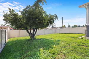 View of fenced backyard