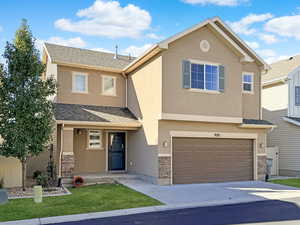 Darling two story home in the heart of Foxboro. 3 bedroom, 2 1/2 bath, 2 car garage and new carpet await you.