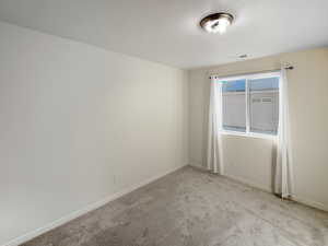 Upstairs bedroom with brand new paint & carpet