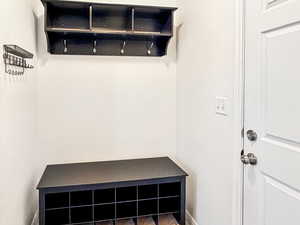 Mudroom right off the garage with bench shelf for all your storage needs