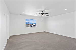 Unfurnished room with carpet, recessed lighting, and ceiling fan