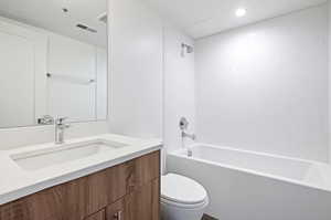 Modern Bathroom featuring vanity and shower / tub combination