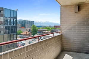 Balcony featuring a mountain view the Wasatch