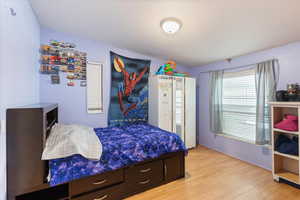 Bedroom featuring light wood-style floors