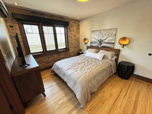 Bedroom with light wood-type flooring