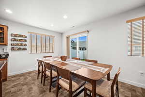 Dining room featuring plenty of natural light and room for a large table.
