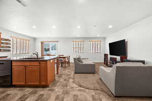 Family Room with large windows and blinds.