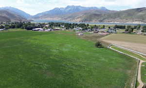 Mountain view featuring a nearby body of water
