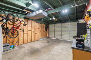 Garage featuring a garage door opener