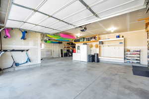 3 car garage, extra depth, featuring tons of storage, insulated garage doors, garage door openers.