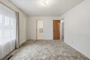 Primary Bedroom with door to bathroom