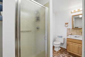 Bathroom with shower and vanity