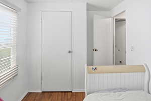 Bedroom with wood finished floors