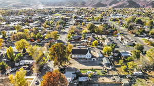 Aerial view of residential area featuring a mountain backdrop