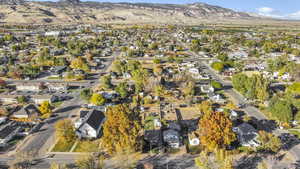 View of property location with nearby suburban area and a mountainous background