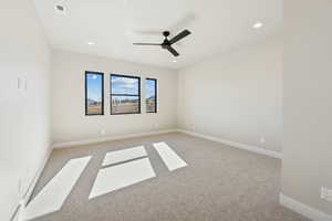 Unfurnished room with carpet, ceiling fan, and recessed lighting