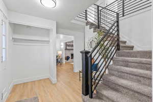 Staircase featuring new metal railing