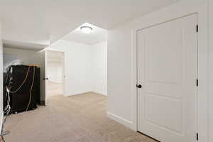 Bonus room with carpet and baseboards