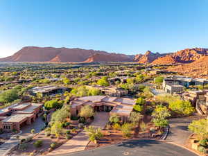 View of mountain background featuring nearby suburban area