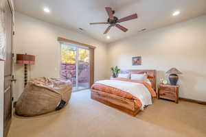 Bedroom with carpet, access to exterior, recessed lighting, and a ceiling fan