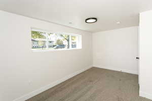 Empty room featuring carpet