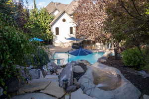 View of pool with a patio area